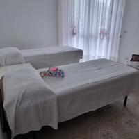 Due letti + armadio + poltrona