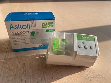 Distributore mangime pesci + mangime pesci