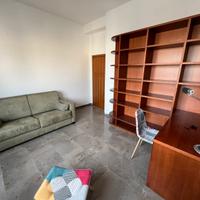 Camera Studio con Divano Letto