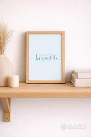 Quadro con stampa “breathe” con cornice