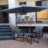 Arredo da esterno tendone tavolino e 2 sedie
