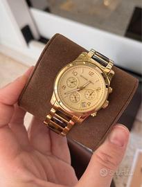 Orologio MK oro