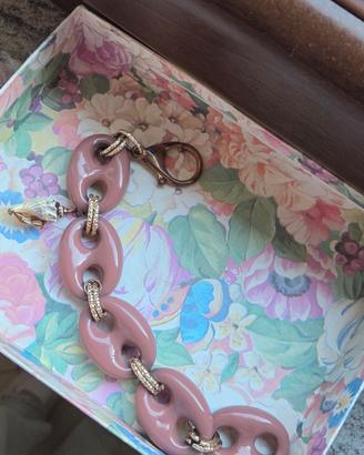 Braccialetto rosa con ciondolo conchiglia