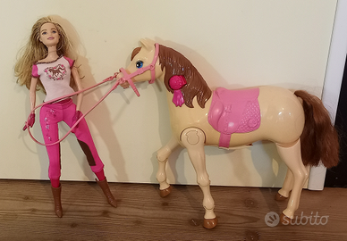 Barbie a cavallo con bambina Barbie a cavallo
