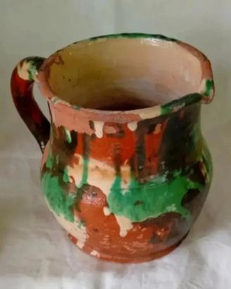 Antica brocca in terracotta marmorizzata 