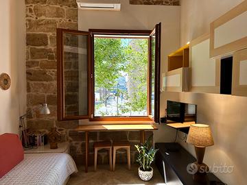 Elegante Loft in Piazza Sulis con vista mare