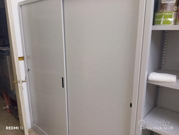 Due Armadi metallici ante scorrevoli 