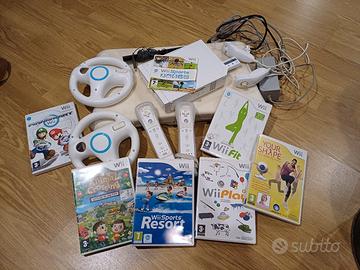 console Wii con bilance bordo con giochi