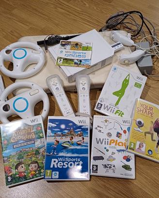 console Wii con bilance bordo con giochi