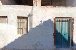 Rustico con terreno adiacente