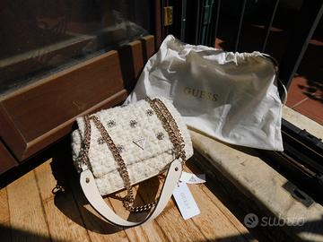 Borsa nuova di GUESS, bianca con brillantini.