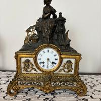 Orologio a pendolo in bronzo