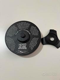 Applicatore etichette cd / dvd Neato