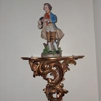 Mensola antica dorata con statuina 