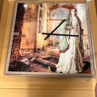 Orologio in vetro con quadro d’epoca