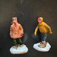 Due personaggi con ciaspole lemax