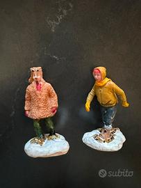Due personaggi con ciaspole lemax