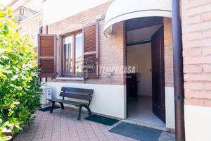 BILOCALE CON GIARDINO E GARAGE