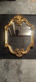 Spechio con cornice in legno