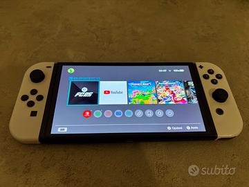 Nintendo Switch OLED 64GB + SD 128GB