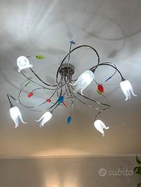 Lampadario in acciaio con foglie in vetro colorate