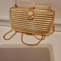 Pochette in metallo colore oro