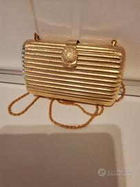 Pochette in metallo colore oro