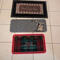 tre tappetini da ingresso