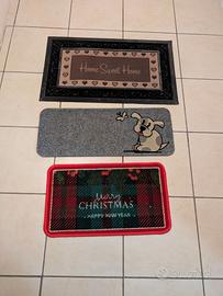 tre tappetini da ingresso