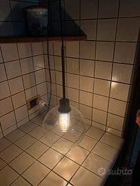 Lampada a sospensione a sfera in vetro trasparente