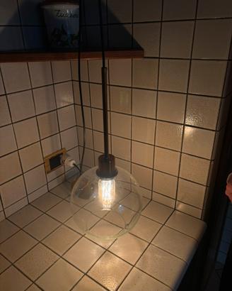 Lampada a sospensione a sfera in vetro trasparente