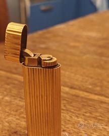 Accendino Cartier e scatola braccialetto 