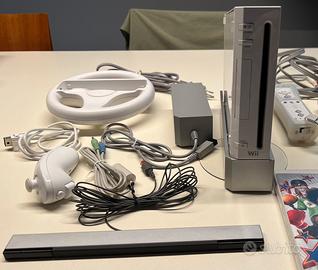 Nintendo Wii + controller + nunchuck + volante