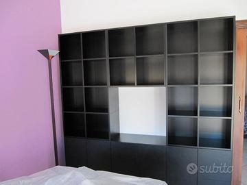 La libreria C.E.O. Cube di Poltrona Frau