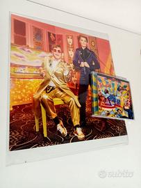 Poster autografato e CD di Elton John