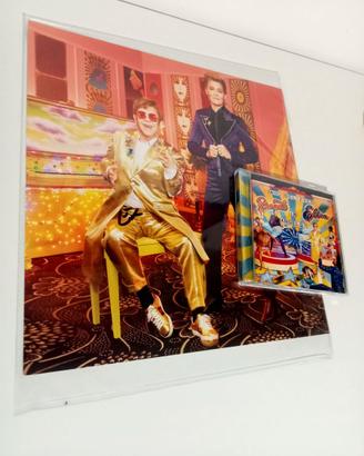 Poster autografato e CD di Elton John
