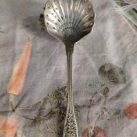 cucchiaio spargi zucchero