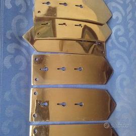 Fibbie in ottone a freccia, lunghezza cm 15 x 5