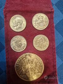 Sterline d’oro e 100 Corone Austria monete origina