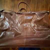 I SANTI valigio morbida in pelle marrone