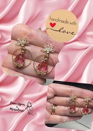 Orecchini pendenti rosa