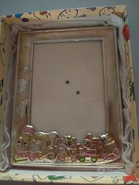 Cornice argento neonata Enrico Coveri