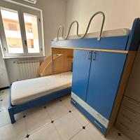 Letto a castello scorrevole con armadio integrato