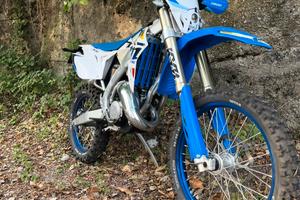 tm 125 EN