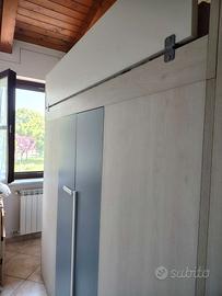 Cabina armadio con letto soppalcato
