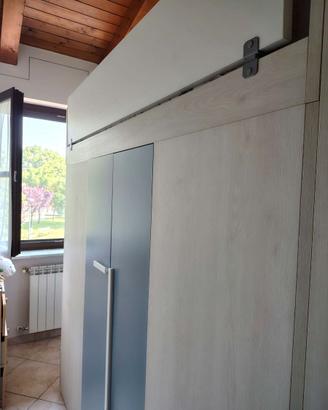 Cabina armadio con letto soppalcato