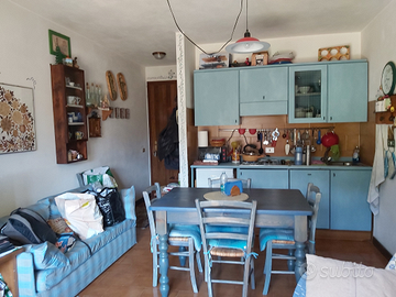 Bilocale temu' ponte di legno