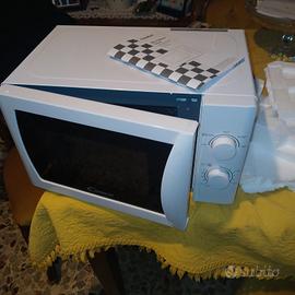 forno microonde 20 lt candy  non spedisco 