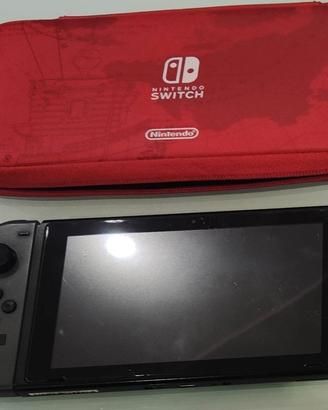 Nintendo Switch completa di accessori e M.I.G.