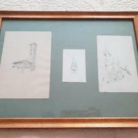 Cornice con 3 disegni di torri